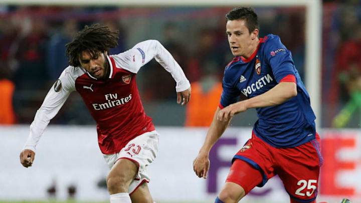 MOSCOW, RUSSIA - APRIL 12: Roman Eremenko of PFC CSKA Moskva vies for the ball with Mohamed Elneny of Arsenal FC during the UEFA Europa League quarter final leg two match between PFC CSKA Moskva and Arsenal FC at CSKA Arena stadium on April 12, 2018 in Moscow, Russia. (Photo by Oleg Nikishin/Getty Images)