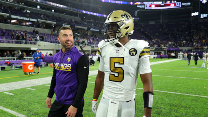 NFL DraftKings: MINNEAPOLIS, MN - OCTOBER 28: Andrew Sendejo #34 of the Minnesota Vikings greets former teammate Teddy Bridgewater #5 of the New Orleans Saints after the game at U.S. Bank Stadium on October 28, 2018 in Minneapolis, Minnesota. The Saints defeated the Vikings 30-20. (Photo by Adam Bettcher/Getty Images)