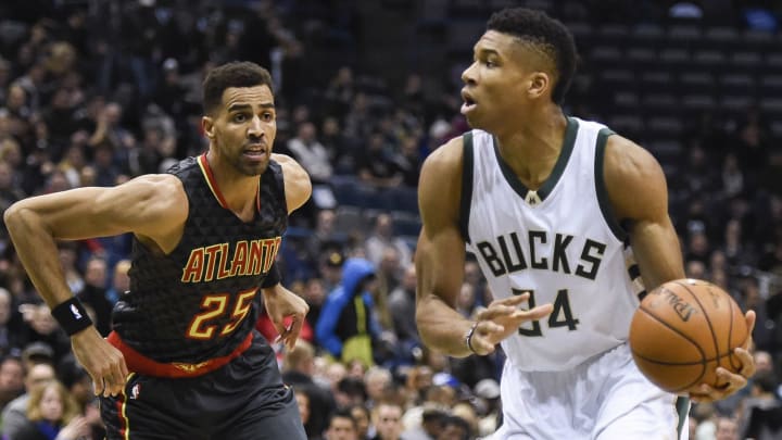 Dec 9, 2016; Milwaukee, WI, USA; Milwaukee Bucks forward Giannis Antetokounmpo (34) drives for the basket against Atlanta Hawks forward Thabo Sefolosha (25) in the first quarter at BMO Harris Bradley Center. Mandatory Credit: Benny Sieu-USA TODAY Sports