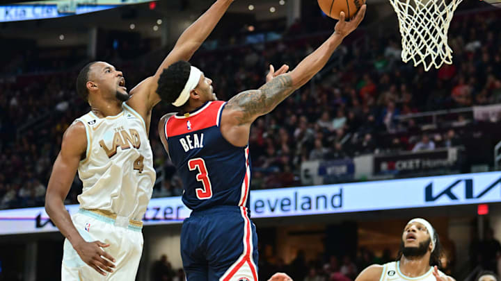 Mar 17, 2023; Cleveland, Ohio, USA; Washington Wizards guard Bradley Beal (3) drives to the basket against Cleveland Cavaliers forward Evan Mobley (4) during the second half at Rocket Mortgage FieldHouse. Mandatory Credit: Ken Blaze-USA TODAY Sports