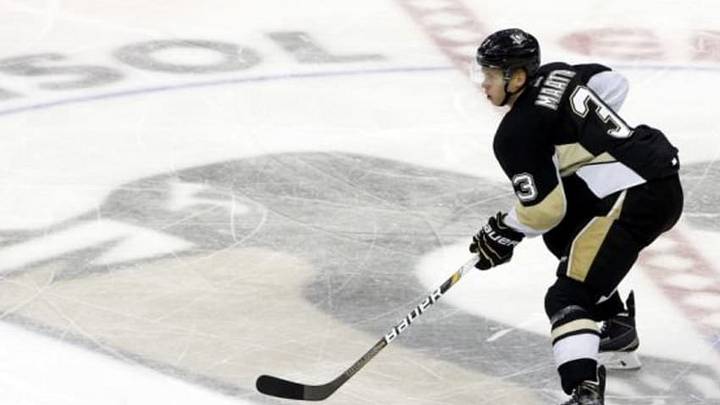 Nov 1, 2014; Pittsburgh, PA, USA; Pittsburgh Penguins defenseman Olli Maatta (3) skates through center ice with the puck against the Buffalo Sabres during the second period at the CONSOL Energy Center. The Penguins won 5-0. Mandatory Credit: Charles LeClaire-USA TODAY Sports