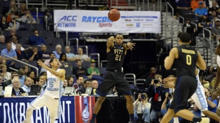 Mar 10, 2016; Washington, DC, USA; Pittsburgh Panthers forward Sheldon Jeter (21) passes up the court as North Carolina Tar Heels guard Marcus Paige (5) defends in the second half during day three of the ACC conference tournament at Verizon Center. North Carolina Tar Heels defeated Pittsburgh Panthers 88-71. Mandatory Credit: Tommy Gilligan-USA TODAY Sports