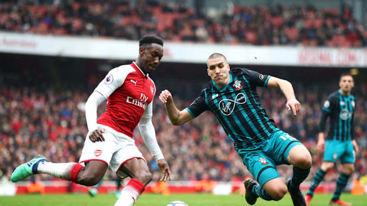 LONDON, ENGLAND - APRIL 08: Danny Welbeck of Arsenal and Oriol Romeu of Southampton in action during the Premier League match between Arsenal and Southampton at Emirates Stadium on April 8, 2018 in London, England. (Photo by Julian Finney/Getty Images)