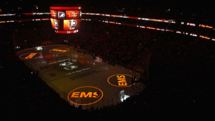 PHILADELPHIA, PA - APRIL 18: An overall view of the Wells Fargo Center during a moment of silence for late Philadelphia Flyers owner Ed Snider, prior to the start of Game Three of Eastern Conference First Round during the 2016 NHL Stanley Cup Playoffs on April 18, 2016 in Philadelphia, Pennsylvania. (Photo by Steve Caplan/NHLI via Getty Images)