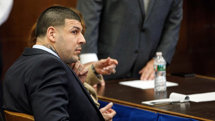 Apr 12, 2017; Boston, MA, USA; Former New England Patriots tight end Aaron Hernandez sits at the defense table during jury deliberations in his double murder trial of at Suffolk Superior Court . Hernandez is charged in the July 2012 killings of Daniel de Abreu and Safiro Furtado who he encountered in a Boston nightclub. The former NFL football player already is serving a life sentence in the 2013 killing of semi-professional football player Odin Lloyd. Mandatory Credit: Pool photo by Keith Bedford/The Boston Globe