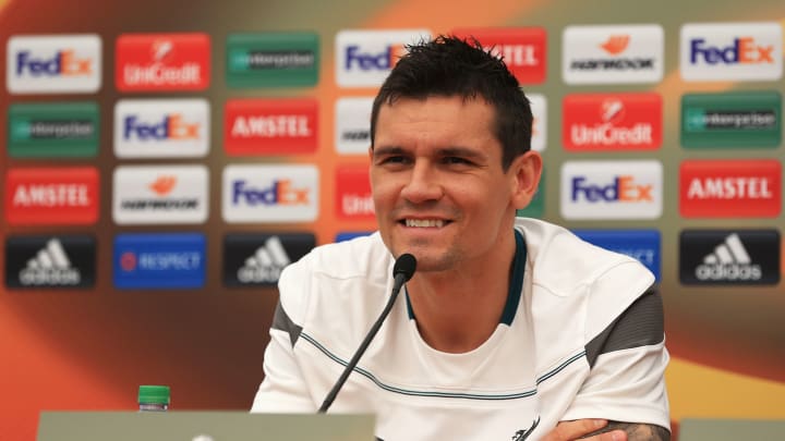 LIVERPOOL, ENGLAND – MAY 04: Dejan Lovren of Liverpool talks during a press conference ahead of the UEFA Europa League Semi-Final Second Leg match against Villarreal at Melwood Training Ground on May 4, 2016 in Liverpool, England. (Photo by Clint Hughes/Getty Images)