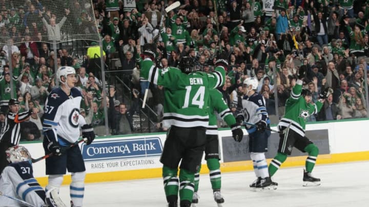 DALLAS, TX - JANUARY 19: Jamie Benn #14 and the Dallas Stars celebrate a goal against the Winnipeg Jets at the American Airlines Center on January 19, 2019 in Dallas, Texas. (Photo by Glenn James/NHLI via Getty Images)