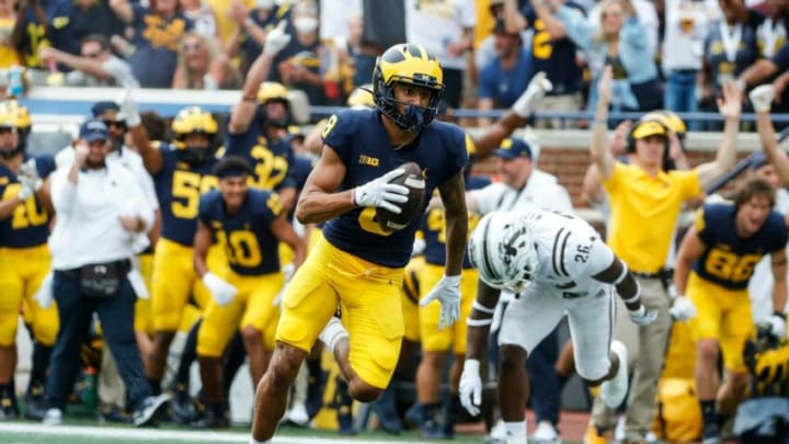 Michigan wide receiver Ronnie Bell runs after making a catch against Western Michigan during the first half in Ann Arbor on Saturday, Sept. 4, 2021.