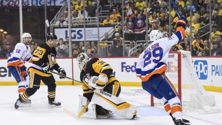 PITTSBURGH, PA - APRIL 14: New York Islanders center Brock Nelson (29) scores a goal past Pittsburgh Penguins goaltender Matt Murray (30) during the first period in Game 3 of the First Round in the 2019 NHL Stanley Cup Playoffs between the New York Islanders and the Pittsburgh Penguins on April 14, 2019, at PPG Paints Arena in Pittsburgh, PA. (Photo by Jeanine Leech/Icon Sportswire via Getty Images)