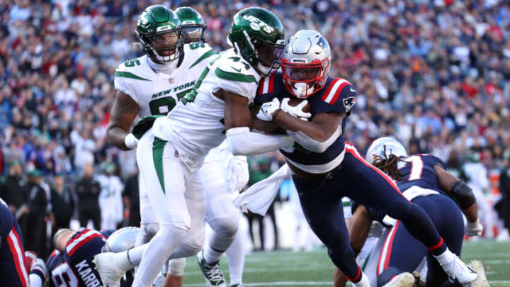 FOXBOROUGH, MASSACHUSETTS - OCTOBER 24: Damien Harris #37 of the New England Patriots scores a touchdown past Jamien Sherwood #44 of the New York Jets at Gillette Stadium on October 24, 2021 in Foxborough, Massachusetts. (Photo by Maddie Meyer/Getty Images)