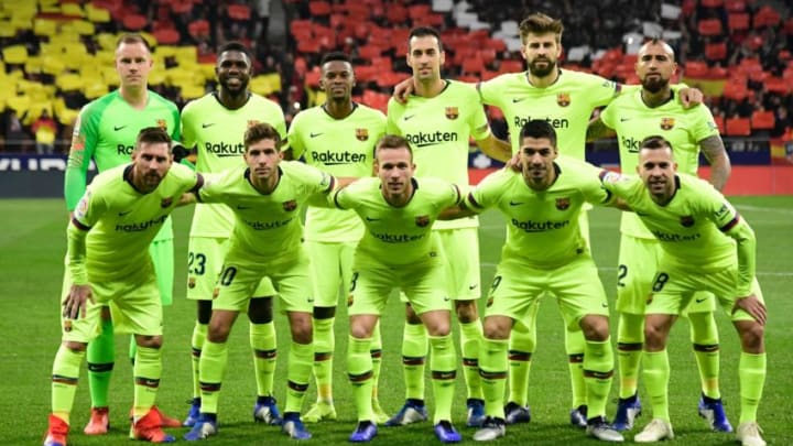 (Back L-R) Barcelona's German goalkeeper Marc-Andre Ter Stegen, Barcelona's French defender Samuel Umtiti, Barcelona's Portuguese defender Nelson Semedo, Barcelona's Spanish midfielder Sergio Busquets, Barcelona's Spanish defender Gerard Pique, Barcelona's Chilean midfielder Arturo Vidal, (L-R) Barcelona's Argentinian forward Lionel Messi, Barcelona's Spanish midfielder Sergi Roberto, Barcelona's Brazilian midfielder Arthur, Barcelona's Uruguayan forward Luis Suarez and Barcelona's Spanish defender Jordi Alba pose for a group picture ahead of the Spanish league football match between Club Atletico de Madrid and FC Barcelona at the Wanda Metropolitano stadium in Madrid on November 24, 2018. (Photo by JAVIER SORIANO / AFP) (Photo credit should read JAVIER SORIANO/AFP/Getty Images)