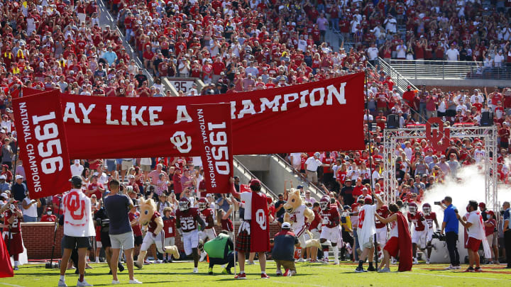 NORMAN, OK – SEPTEMBER 18: The Oklahoma Sooners run onto the field for a game against the Nebraska Cornhuskers at Gaylord Family Oklahoma Memorial Stadium on September 18, 2021 in Norman, Oklahoma. Oklahoma won 23-16. (Photo by Brian Bahr/Getty Images)