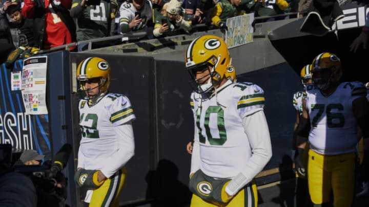 Dec 4, 2022; Chicago, Illinois, USA; Green Bay Packers quarterback Aaron Rodgers (12) and quarterback Jordan Love (10) during warmups before a game against the Chicago Bears at Soldier Field. Mandatory Credit: Matt Marton-USA TODAY Sports
