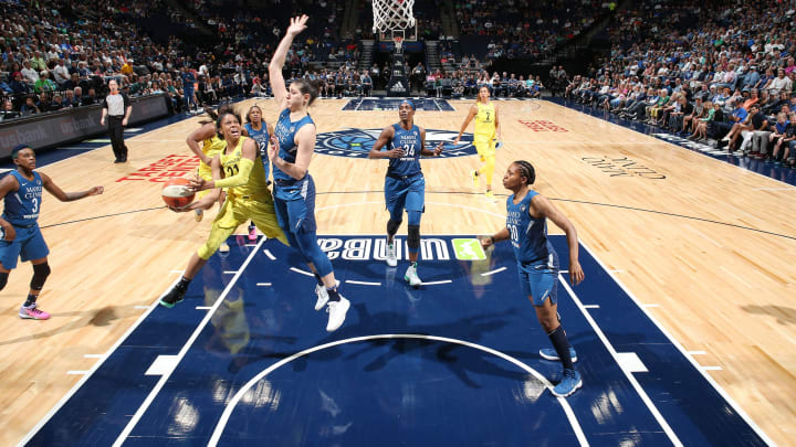 MINNEAPOLIS, MN – JUNE 26: Guard Jordin Canada #21 of the Seattle Storm drives to the basket during the game against the Minnesota Lynx on June 26, 2018 at Target Center in Minneapolis, Minnesota. NOTE TO USER: User expressly acknowledges and agrees that, by downloading and or using this photograph, User is consenting to the terms and conditions of the Getty Images License Agreement. Mandatory Copyright Notice: Copyright 2018 NBAE (Photo by David Sherman/NBAE via Getty Images)