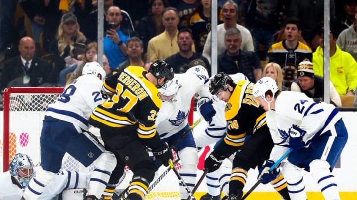 BOSTON, MA - APRIL 13: The Boston Bruins and the Toronto Maple Leafs fight for the puck during Game Two of the Eastern Conference First Round during the 2019 NHL Stanley Cup Playoffs at TD Garden on April 13, 2019 in Boston, Massachusetts. (Photo by Adam Glanzman/Getty Images)