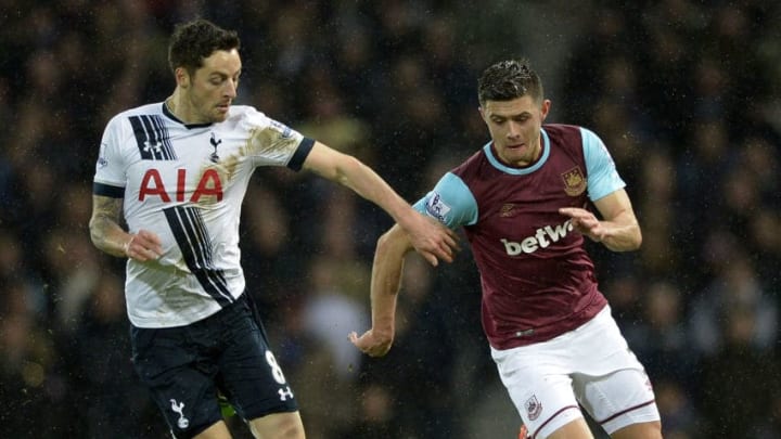 LONDON, ENGLAND - MARCH 02: Aaron Cresswell of West Ham United in action with Tottenham's Ryan Mason during the Barclays Premier League match between West Ham United and Tottenham Hotspur at Boleyn Ground on March 2, 2016 in London, England. (Photo by James Griffiths/West Ham United via Getty Images)