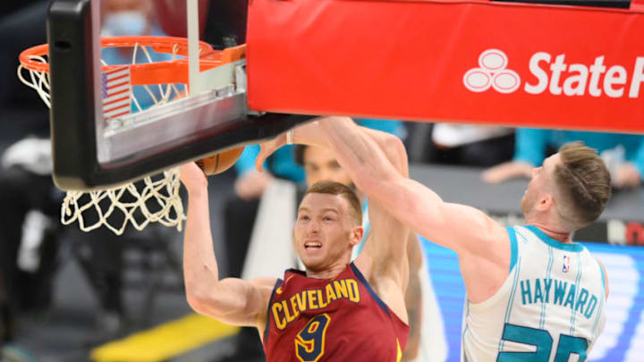 Cleveland Cavaliers wing Dylan Windler is fouled hard on a drive to the basket. (Photo by David Richard-USA TODAY Sports)