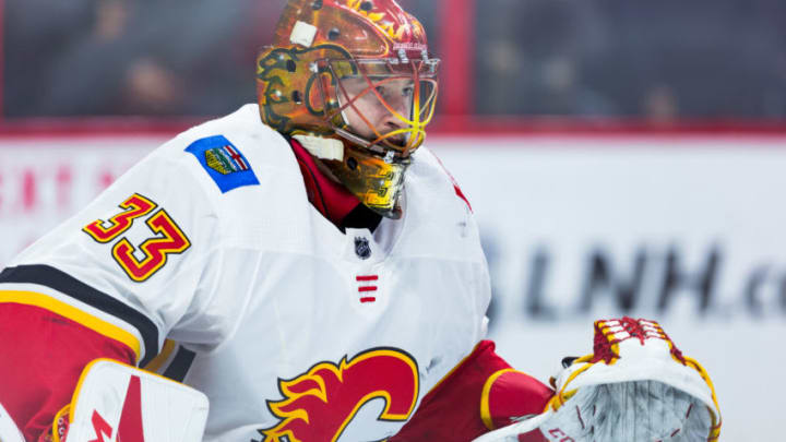 OTTAWA, ON - MARCH 09: Calgary Flames Goalie David Rittich (33) prepares to make a save during warm-up before National Hockey League action between the Calgary Flames and Ottawa Senators on March 9, 2018, at Canadian Tire Centre in Ottawa, ON, Canada. (Photo by Richard A. Whittaker/Icon Sportswire via Getty Images)