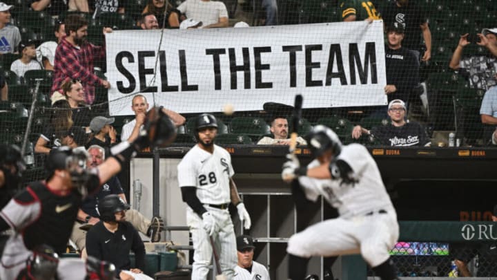 Aug 27, 2022; Chicago, Illinois, USA; Frustrated Chicago White Sox fans hold up a sign urging to sell the team as outfielder AJ Pollock (18) bats in the ninth inning against the Arizona Diamondbacks at Guaranteed Rate Field. Arizona defeated Chicago 10-5. Mandatory Credit: Jamie Sabau-USA TODAY Sports