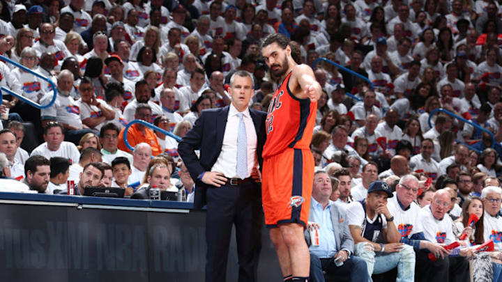 OKLAHOMA CITY, OK - APRIL 23: OKC Thunder Head Coach Billy Donovan and Steven Adams talk over strategy during the NBA Playoffs. (Photo by Nathaniel S. Butler/NBAE via Getty Images)