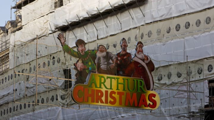 LONDON, ENGLAND - NOVEMBER 19: A large promotional billboard for "Arthur Christmas" hangs high above Piccadilly Circus on November 19, 2011 in London, England. An unusually warm day in Central London greeted tourists visiting this historic city known more for its fog and damp weather. (Photo by George Rose/Getty Images)