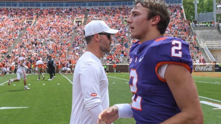 April 15, 2023; Clemson, SC , USA; Clemson offensive coordinator Garrett Riley walks by quarterback Cade Klubnik (2) after his interception throw during the second quarter the annual Orange and White Spring game at Memorial Stadium in Clemson, S.C. Saturday, April 15, 2023. Mandatory Credit: Ken Ruinard-USA TODAY NETWORK