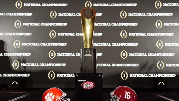 Jan 8, 2017; Tampa, FL, USA; View of the trophy and helmets for Clemson Tigers and Alabama Crimson Tide during the head coaches news conference at the Tampa Convention Center. Mandatory Credit: John David Mercer-USA TODAY Sports