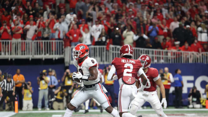 Georgia Bulldogs tight end Darnell Washington makes a touchdown reception over the Alabama Crimson Tide. Image Credit: Jason Getz-USA TODAY Sports