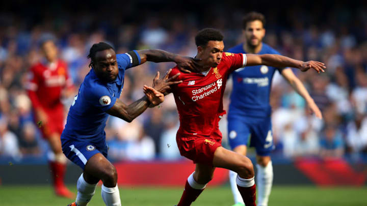 LONDON, ENGLAND - MAY 06: Trent Alexander-Arnold of Liverpool is challenged by Victor Moses of Chelsea during the Premier League match between Chelsea and Liverpool at Stamford Bridge on May 6, 2018 in London, England. (Photo by Julian Finney/Getty Images)
