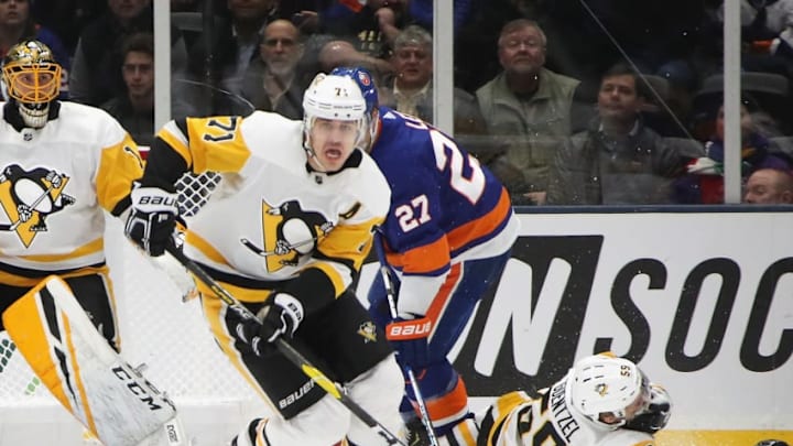 UNIONDALE, NEW YORK - DECEMBER 10: Evgeni Malkin #71 of the Pittsburgh Penguins skates against the New York Islanders at NYCB Live at the Nassau Coliseum on December 10, 2018 in Uniondale, New York. The Penguins defeated the Islanders 2-1 in the shootout. (Photo by Bruce Bennett/Getty Images)