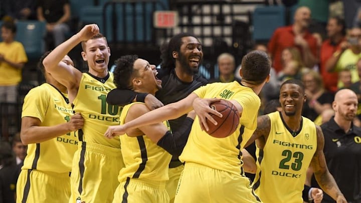 March 12, 2016; Las Vegas, NV, USA; Oregon Ducks players celebrate after the championship game of the Pac-12 Conference tournament against the Utah Utes at MGM Grand Garden Arena. The Ducks defeated the Utes 88-57. Mandatory Credit: Kyle Terada-USA TODAY Sports