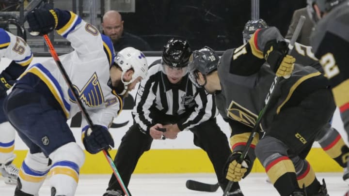 LAS VEGAS, NV - JANUARY 04: St. Louis Blues center Ryan O'Reilly (90) and Vegas Golden Knights center Nicolas Roy (10) face-off during a regular season game Saturday, Jan. 4, 2020, at T-Mobile Arena in Las Vegas, Nevada. (Photo by: Marc Sanchez/Icon Sportswire via Getty Images)