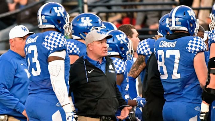 NASHVILLE, TN - NOVEMBER 11: Head coach Mark Stoops of the Kentucky Wildcats coaches during a time out in the first half of a game against the Vanderbilt Commodores at Vanderbilt Stadium on November 11, 2017 in Nashville, Tennessee. (Photo by Frederick Breedon/Getty Images)