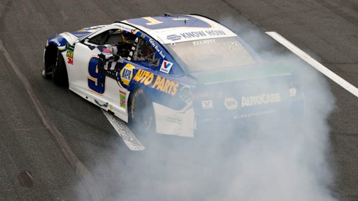 CHARLOTTE, NORTH CAROLINA - SEPTEMBER 29: Chase Elliott, driver of the #9 NAPA Auto Parts Chevrolet, celebrates after winning the Monster Energy NASCAR Cup Series Bank of America ROVAL 400 at Charlotte Motor Speedway on September 29, 2019 in Charlotte, North Carolina. (Photo by Brian Lawdermilk/Getty Images)