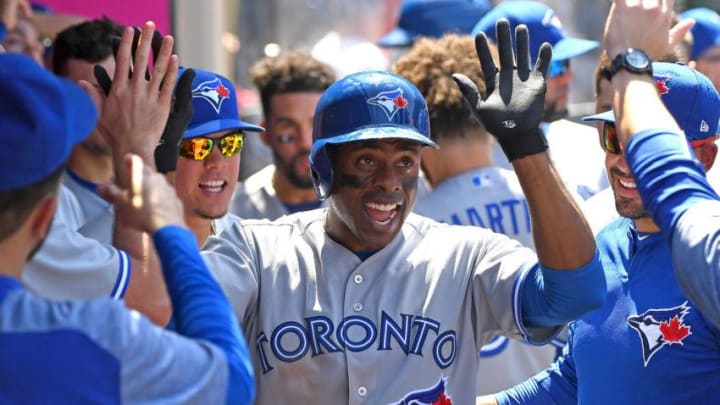 ANAHEIM, CA - JUNE 24: Curtis Granderson #18 of the Toronto Blue Jays is congratulated in the dugout after hitting a solo home run in the sixth inning of the game against the Los Angeles Angels of Anaheim at Angel Stadium on June 24, 2018 in Anaheim, California. (Photo by Jayne Kamin-Oncea/Getty Images)