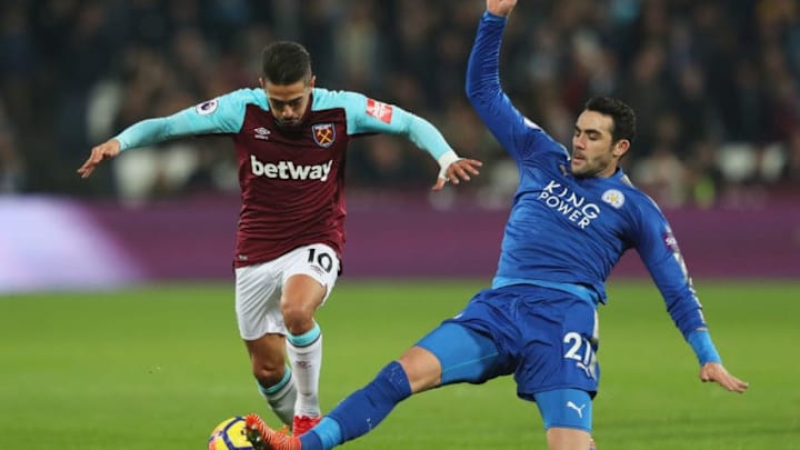 LONDON, ENGLAND – NOVEMBER 24: Manuel Lanzini of West Ham United is challenged by Vicente Iborra of Leicester City during the Premier League match between West Ham United and Leicester City at London Stadium on November 24, 2017 in London, England. (Photo by Matthew Lewis/Getty Images)