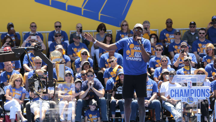 OAKLAND, CA – JUNE 15: Kevin Durant #35 of the Golden State Warriors celebrates winning the 2017 NBA Championship during a parade on June 15, 2017 in Oakland, CA. NOTE TO USER: User expressly acknowledges and agrees that, by downloading and/or using this Photograph, user is consenting to the terms and conditions of the Getty Images License Agreement. Mandatory Copyright Notice: Copyright 2017 NBAE (Photo by Jack Arent/NBAE via Getty Images)