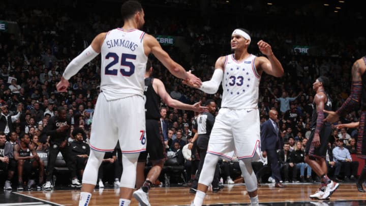 BROOKLYN, NY - APRIL 18: Ben Simmons #25 and Tobias Harris #33 of the Philadelphia 76ers high five during Game Three of Round One of the 2019 NBA Playoffs against the Brooklyn Nets on April 18, 2019 at the Barclays Center in Brooklyn, New York. NOTE TO USER: User expressly acknowledges and agrees that, by downloading and/or using this photograph, user is consenting to the terms and conditions of the Getty Images License Agreement. Mandatory Copyright Notice: Copyright 2019 NBAE (Photo by Nathaniel S. Butler/NBAE via Getty Images)