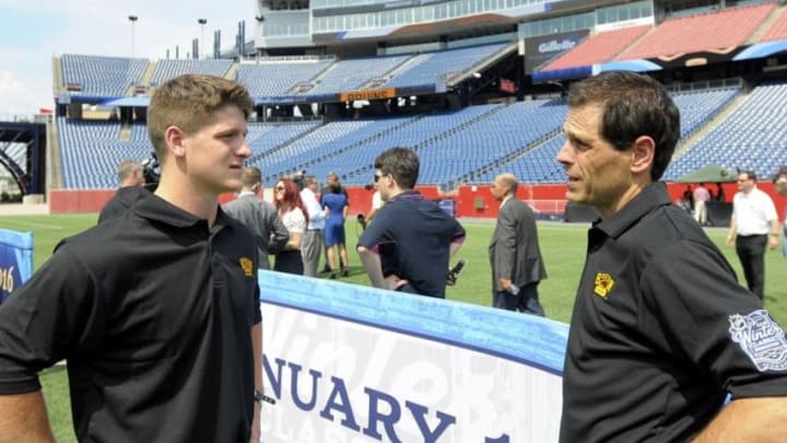 Jul 29, 2015; Foxboro, MA, USA; Boston Bruins defenseman Torey Krug and general manager Don Sweeney chat after a press conference for the Winter Classic hockey game at Gillette Stadium. Mandatory Credit: Bob DeChiara-USA TODAY Sports