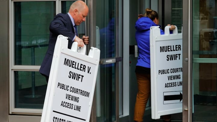 DENVER, CO - AUGUST 07: Courthouse staff remove signs regarding the civil case of Taylor Swift vs David Mueller at the Alfred A. Arraj Courthouse on August 7, 2017 in Denver, Colorado. Swift is suing David Mueller, a former DJ, for assault and battery after he allegedly groped her when they had a photo taken together June 2, 2013 at the Pepsi Center in Denver. Mueller is also suing Swift for allegedly pressuring his former employer, radio station KYGO, to fire him following the incident. (Photo by Joe Mahoney/Getty Images)