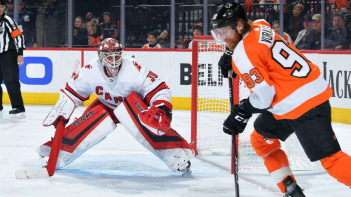 PHILADELPHIA, PA - MARCH 05: Alex Nedeljkovic #39 of the Carolina Hurricanes watches Jakub Voracek #93 of the Philadelphia Flyers in the third period at Wells Fargo Center on March 5, 2020 in Philadelphia, Pennsylvania. The Flyers won 4-1. (Photo by Drew Hallowell/Getty Images)