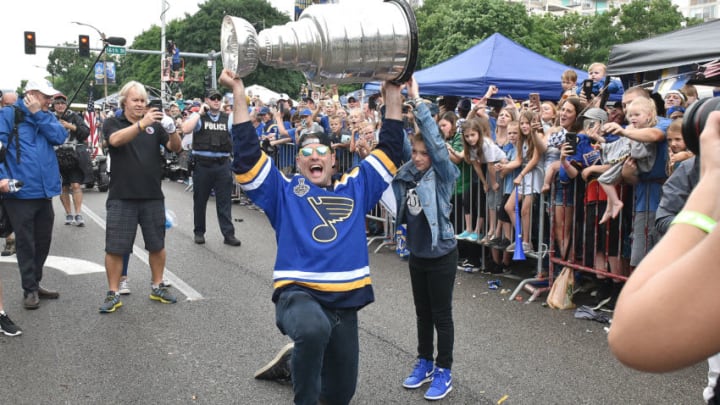 ST. LOUIS, MO - JUN 15: St. Louis Blues leftwing Pat Maroon (7) lifts the Stanley Cup as members of the media look on during the St. Louis Blues victory parade held on June 15, 2019, in downtown, St. Louis, Mo. (Photo by Keith Gillett/Icon Sportswire via Getty Images)