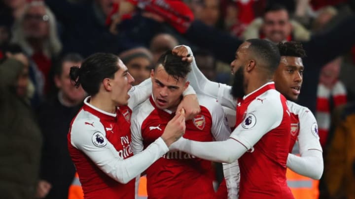 LONDON, ENGLAND - DECEMBER 22: Granit Xhaka of Arsenal (C) celebrates as he scores their second goal with team mates during the Premier League match between Arsenal and Liverpool at Emirates Stadium on December 22, 2017 in London, England. (Photo by Catherine Ivill/Getty Images)