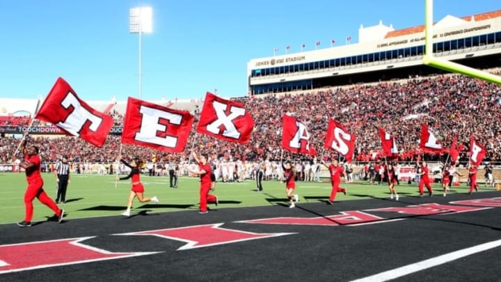 Oct 31, 2015; Lubbock, TX, USA; The Texas Tech Red Raiders cheerleaders celebrate scoring a touchdown against the Oklahoma State Cowboys in the first half at Jones AT&T Stadium. Mandatory Credit: Michael C. Johnson-USA TODAY Sports
