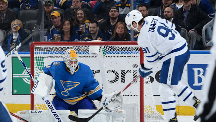 Ill ST. LOUIS, MO - DECEMBER 7: Jake Allen #34 of the St. Louis Blues defends the net against John Tavares #91 of the Toronto Maple Leafs at Enterprise Center on December 7, 2019 in St. Louis, Missouri. (Photo by Scott Rovak/NHLI via Getty Images)