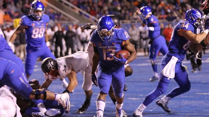 Nov 18, 2016; Boise, ID, USA; Boise State Broncos running back Jeremy McNichols (13) scores in first half action against the UNLV Rebels at Albertsons Stadium. Mandatory Credit: Brian Losness-USA TODAY Sports