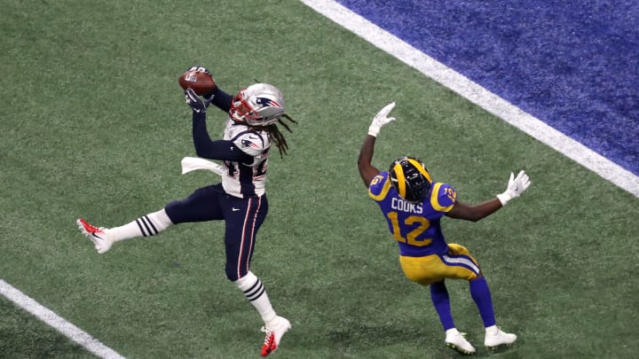 ATLANTA, GEORGIA – FEBRUARY 03: Stephon Gilmore #24 of the New England Patriots catches a fourth quarter interception on a pass intended for Brandin Cooks #12 of the Los Angeles Rams during Super Bowl LIII at Mercedes-Benz Stadium on February 03, 2019 in Atlanta, Georgia. (Photo by Rob Carr/Getty Images)