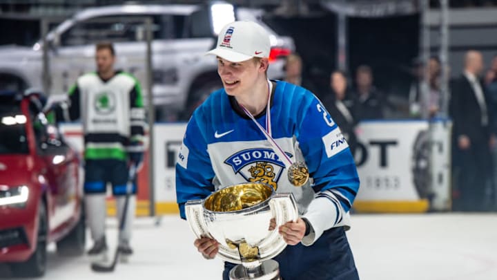 BRATISLAVA, SLOVAKIA - MAY 26: #24 Kaapo Kakko of Finland celebrates with the trophy after the 2019 IIHF Ice Hockey World Championship Slovakia final game between Canada and Finland at Ondrej Nepela Arena on May 26, 2019 in Bratislava, Slovakia. (Photo by RvS.Media/Monika Majer/Getty Images)