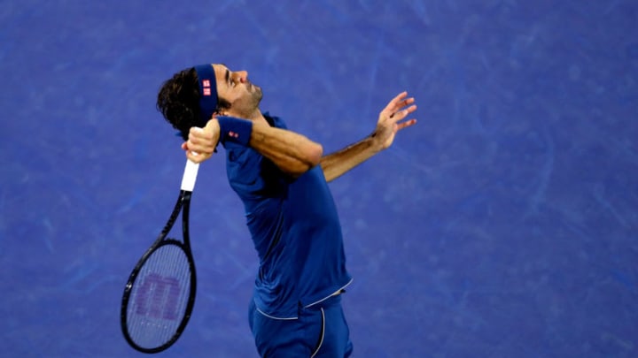 DUBAI, UNITED ARAB EMIRATES - FEBRUARY 28: Roger Federer of Switzerland serves against Marton Fucsovics of Hungary during day twelve of the ATP Dubai Duty Free Tennis Championships at Dubai Duty Free Tennis Stadium on February 28, 2019 in Dubai, United Arab Emirates. (Photo by Francois Nel/Getty Images)