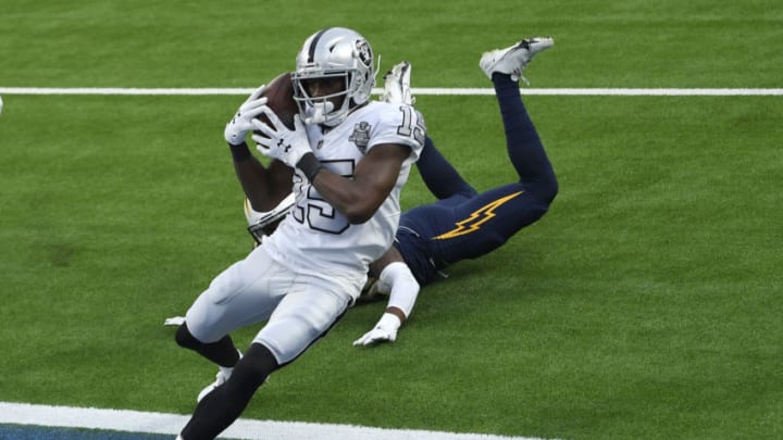 INGLEWOOD, CALIFORNIA - NOVEMBER 08: Nelson Agholor #15 of the Las Vegas Raiders makes a third quarter touchdown catch in front Nasir Adderley #24 of the Los Angeles Chargers of at SoFi Stadium on November 08, 2020 in Inglewood, California. (Photo by Harry How/Getty Images)